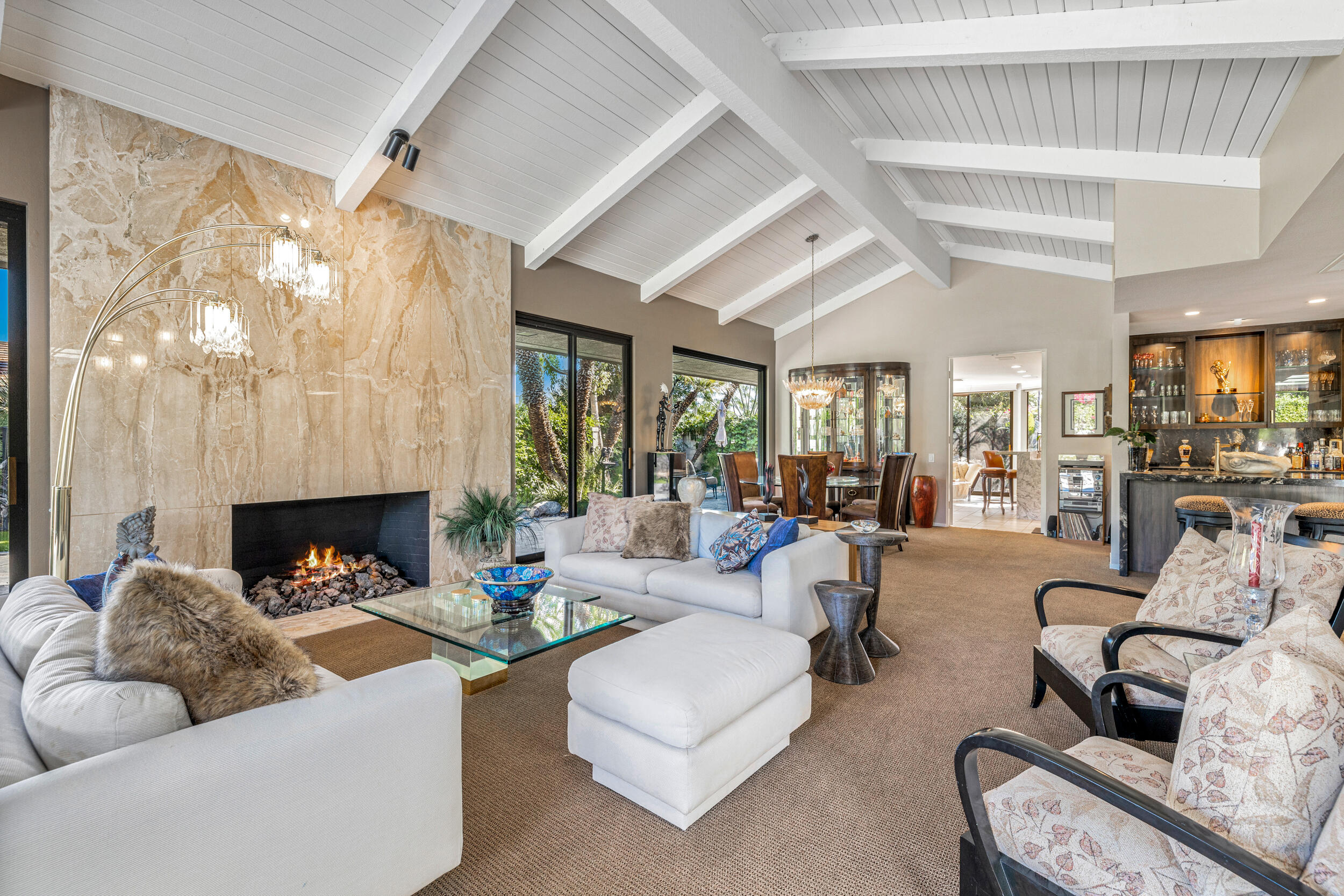 15 Johnar Boulevard Rancho Mirage, CA 92270 - Photo 21 of 68 a living room with furniture and a fireplace