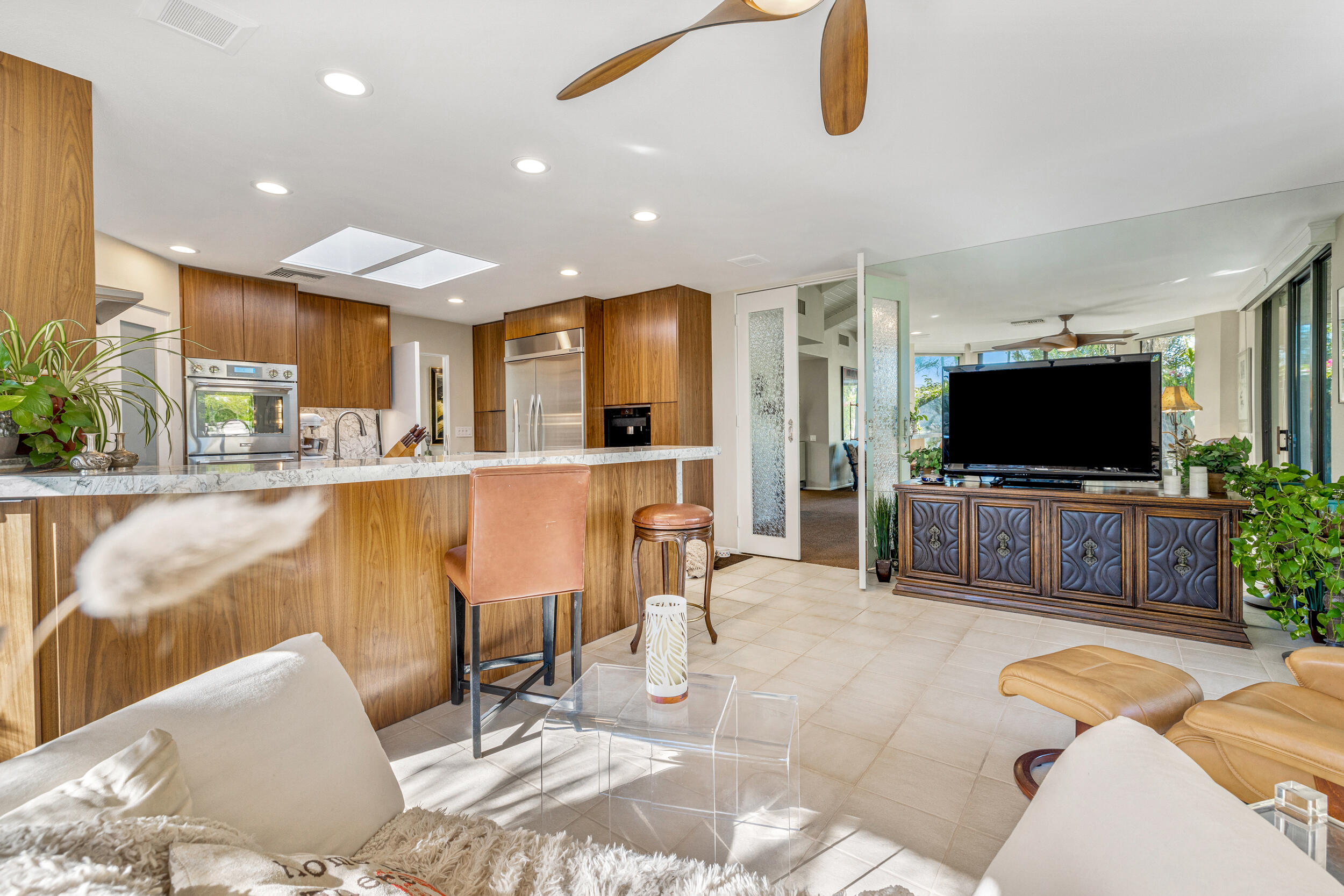 15 Johnar Boulevard Rancho Mirage, CA 92270 - Photo 29 of 68 a living room with furniture and a flat screen tv
