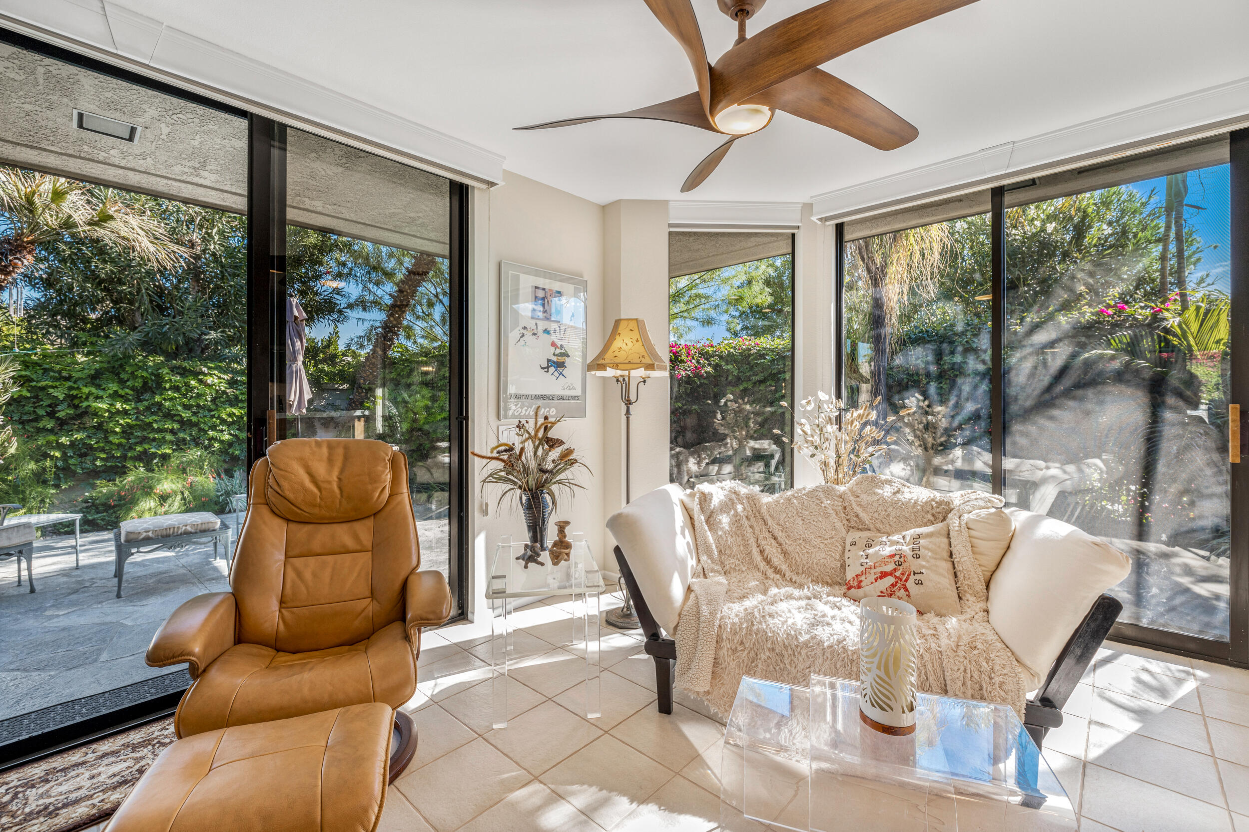 15 Johnar Boulevard Rancho Mirage, CA 92270 - Photo 30 of 68 a living room with furniture and large windows
