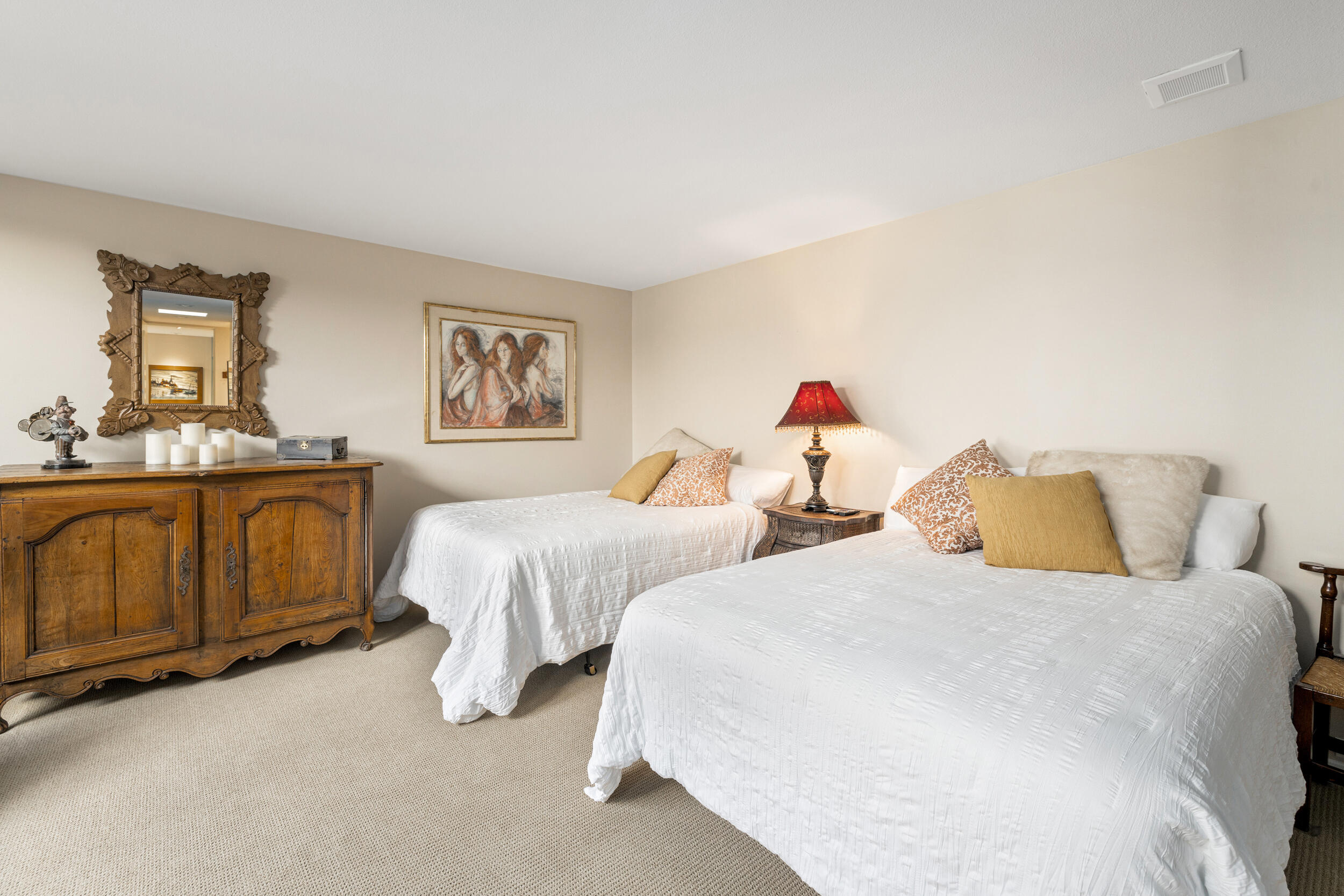 15 Johnar Boulevard Rancho Mirage, CA 92270 - Photo 36 of 68 a bedroom with two beds and painting on the wall