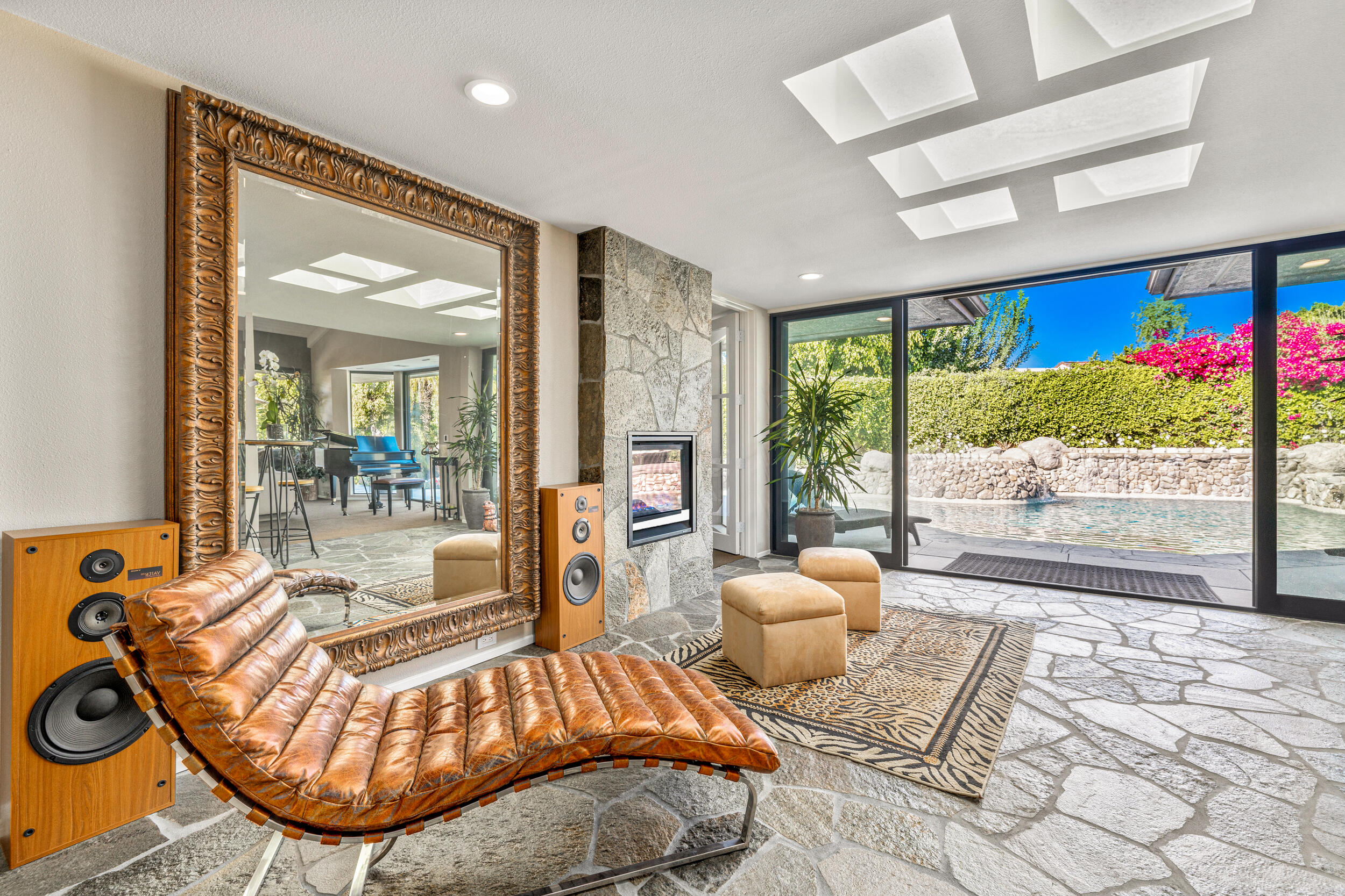 15 Johnar Boulevard Rancho Mirage, CA 92270 - Photo 41 of 68 a living room with furniture and a large window