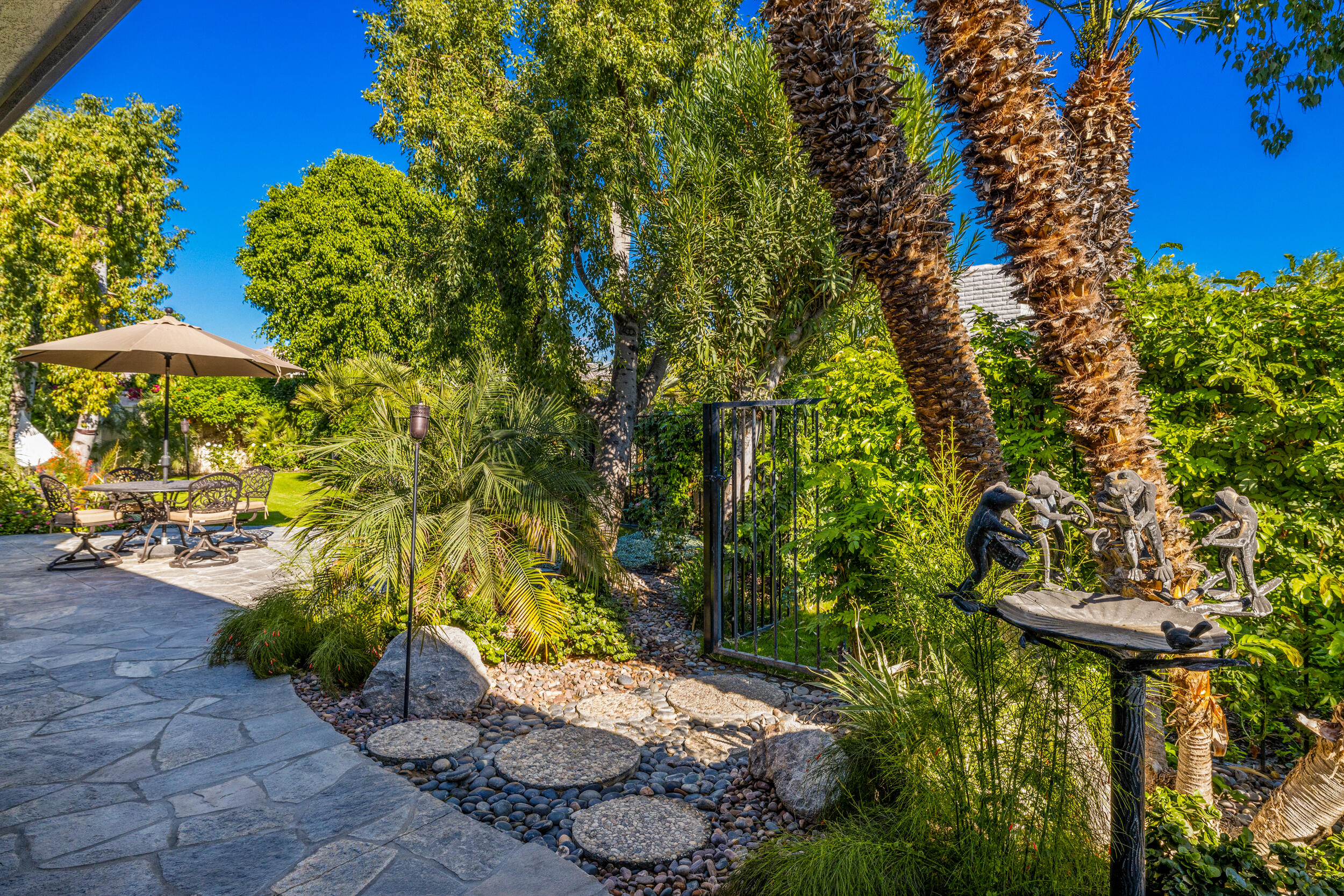 15 Johnar Boulevard Rancho Mirage, CA 92270 - Photo 52 of 68 a view of an outdoor space and a yard