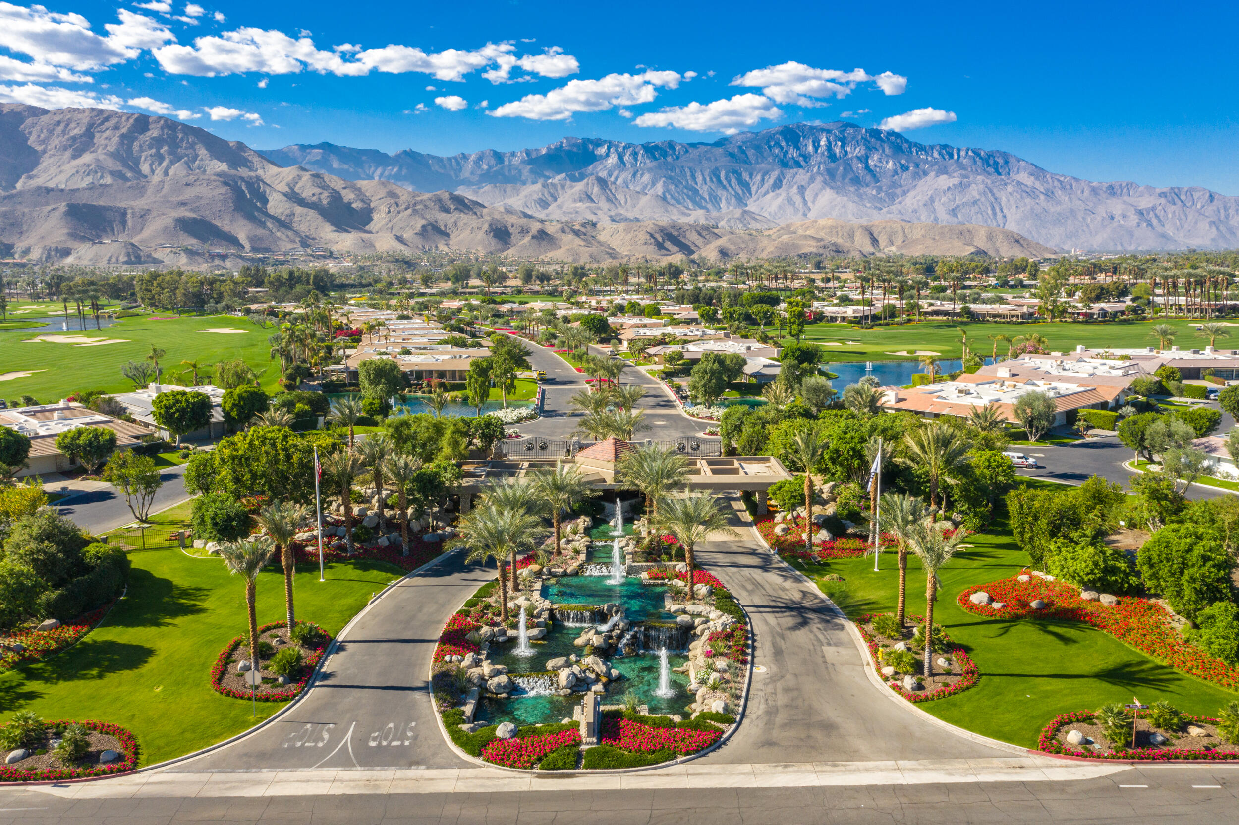 15 Johnar Boulevard Rancho Mirage, CA 92270 - Photo 59 of 68 a view of a city with lots of residential buildings and mountain view in back