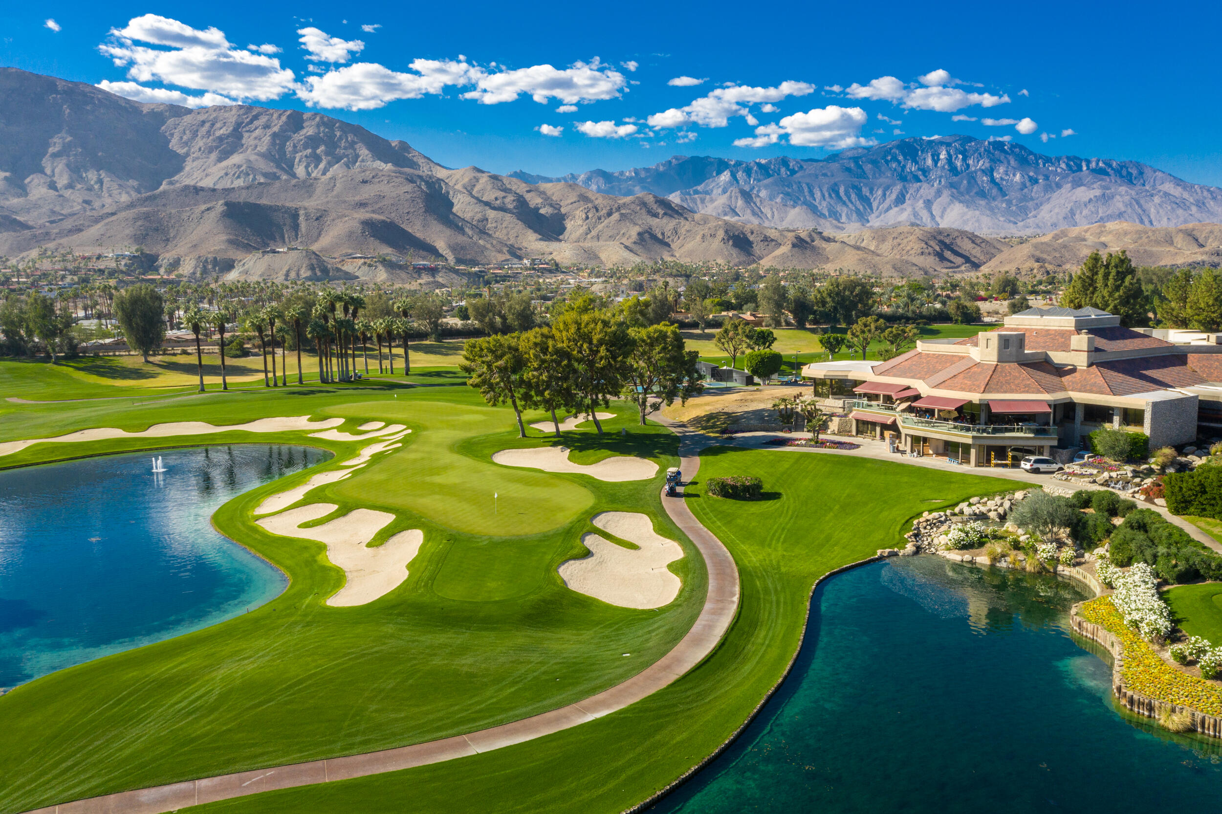 15 Johnar Boulevard Rancho Mirage, CA 92270 - Photo 65 of 68 a view of a swimming pool with a yard