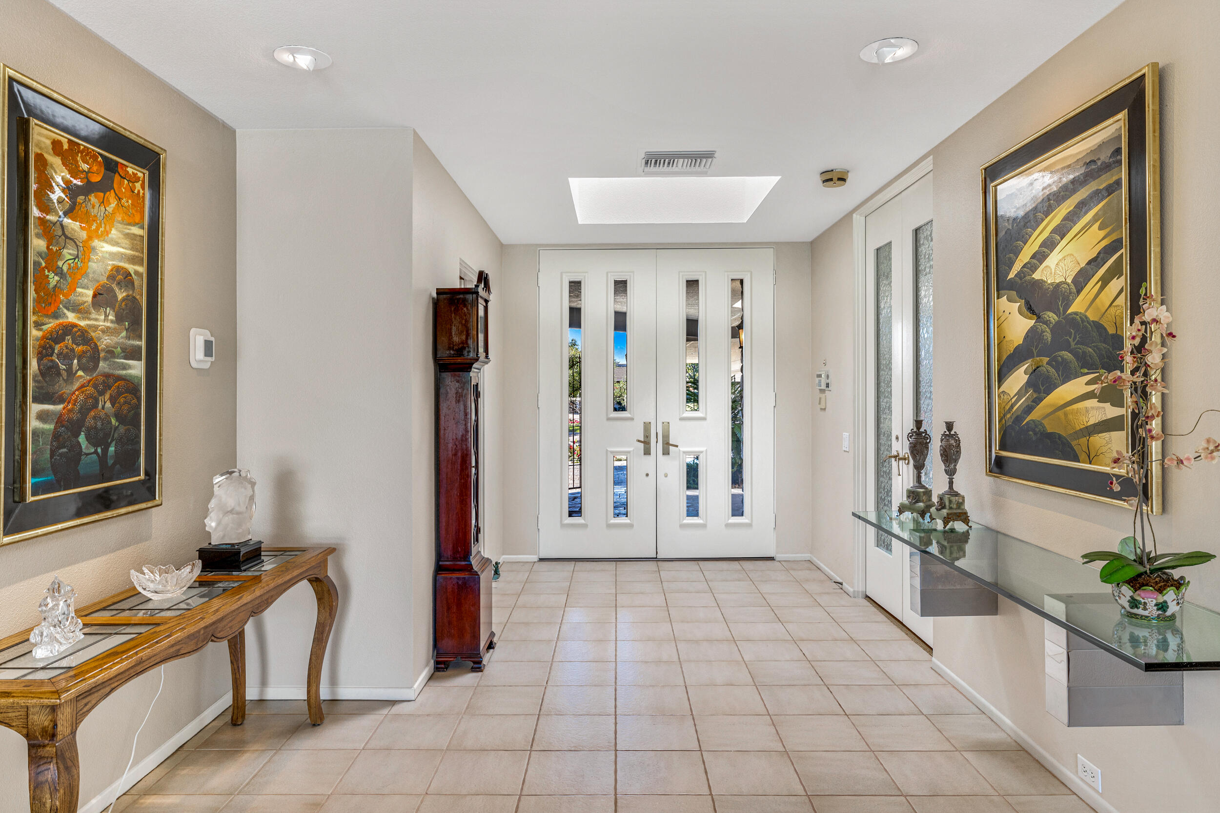 15 Johnar Boulevard Rancho Mirage, CA 92270 - Photo 9 of 68 a view of an entryway with wooden floor