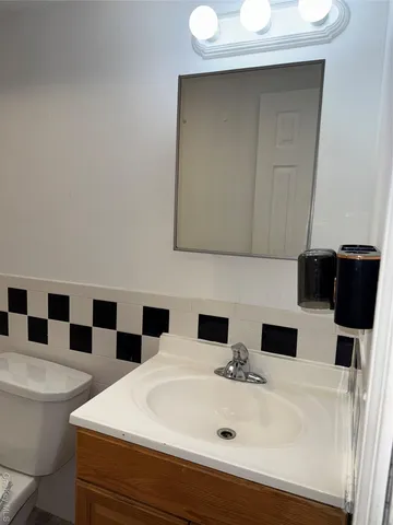 a bathroom with a sink and a toilet