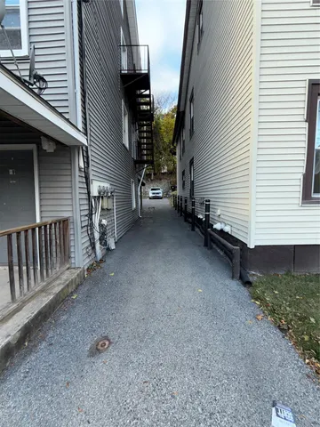 a view of a house with backyard