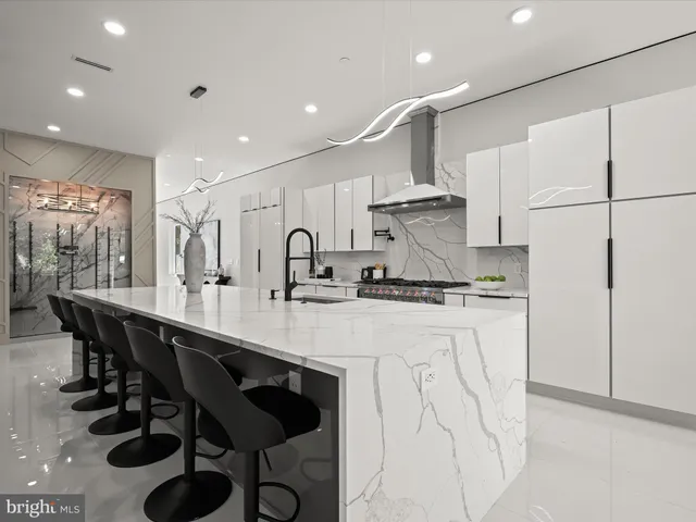 a view of a living room and a balcony