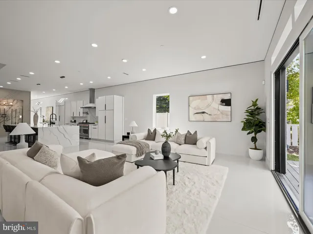 a bathroom with a double vanity sink mirror and shower