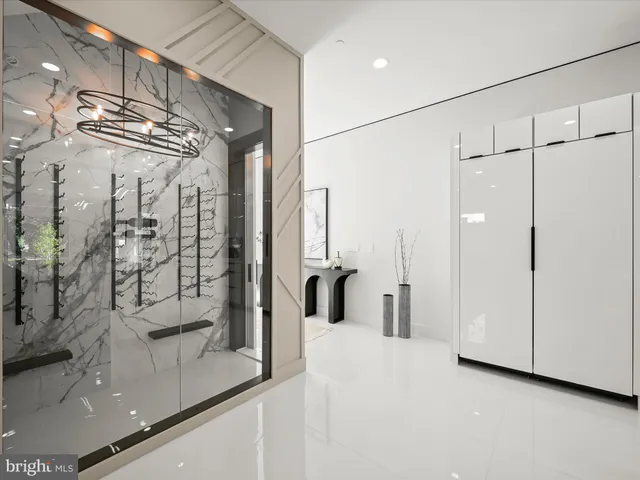 a view of a storage and utility room with a washer dryer