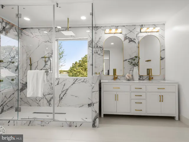 a view of a hallway with seating area