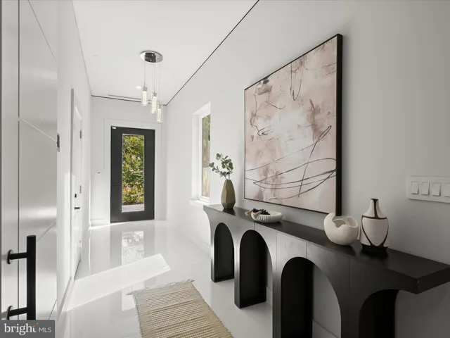 a kitchen with stainless steel appliances kitchen island granite countertop a sink and cabinets