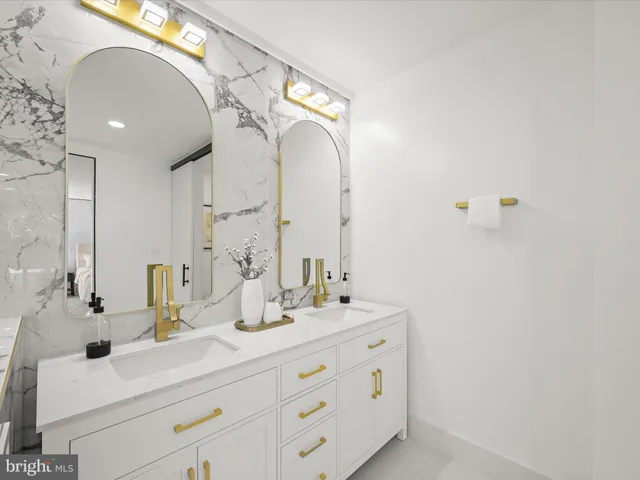 a view of a lake with a house in the background