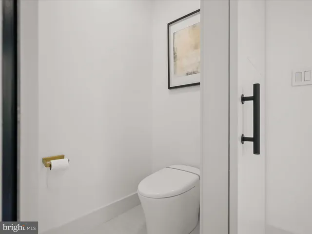 a view of a lake with a house in the background