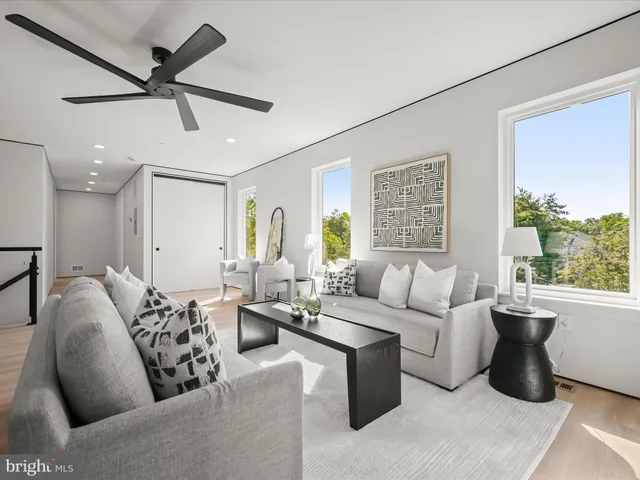 a black and white photo of a living room