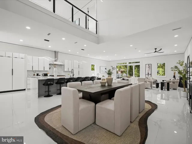 a kitchen with a sink and a large window