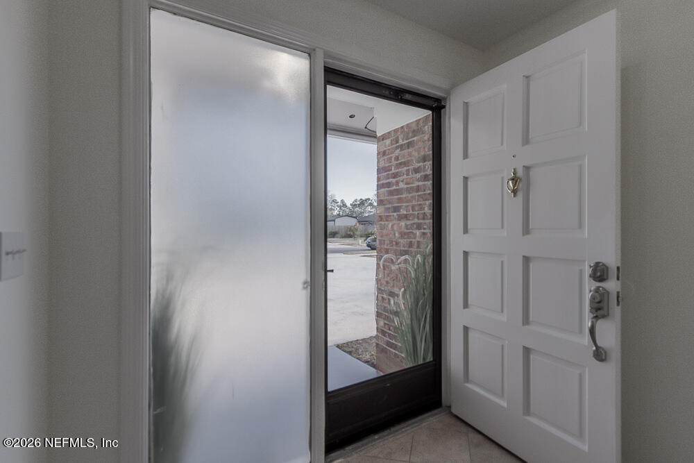 8209 Worm Wood Road Jacksonville, FL 32210 - Photo 13 of 44 a view of elevator with hallway