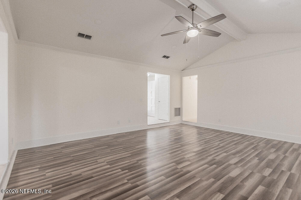 8209 Worm Wood Road Jacksonville, FL 32210 - Photo 16 of 44 wooden floor in an empty room