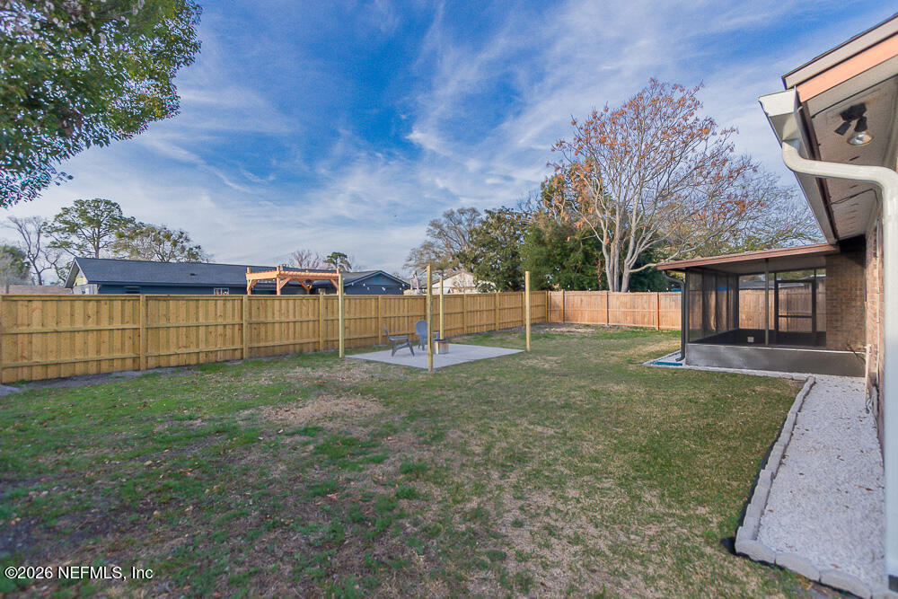 8209 Worm Wood Road Jacksonville, FL 32210 - Photo 7 of 44 a view of a backyard