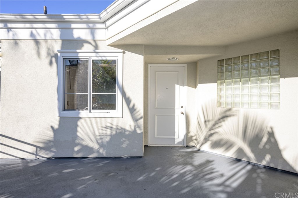 2243 Martin, Unit 409 Irvine, CA 92612 - Photo 2 of 43 a view of a room with wooden floor and windows