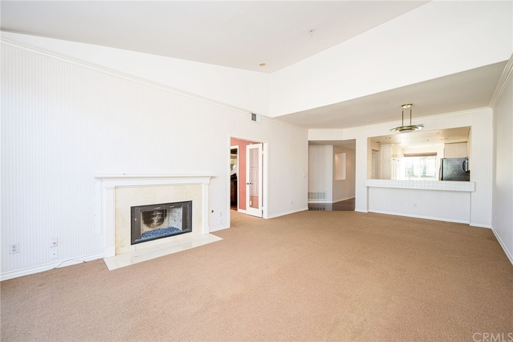 2243 Martin, Unit 409 Irvine, CA 92612 - Photo 13 of 43 a view of empty room with a fireplace