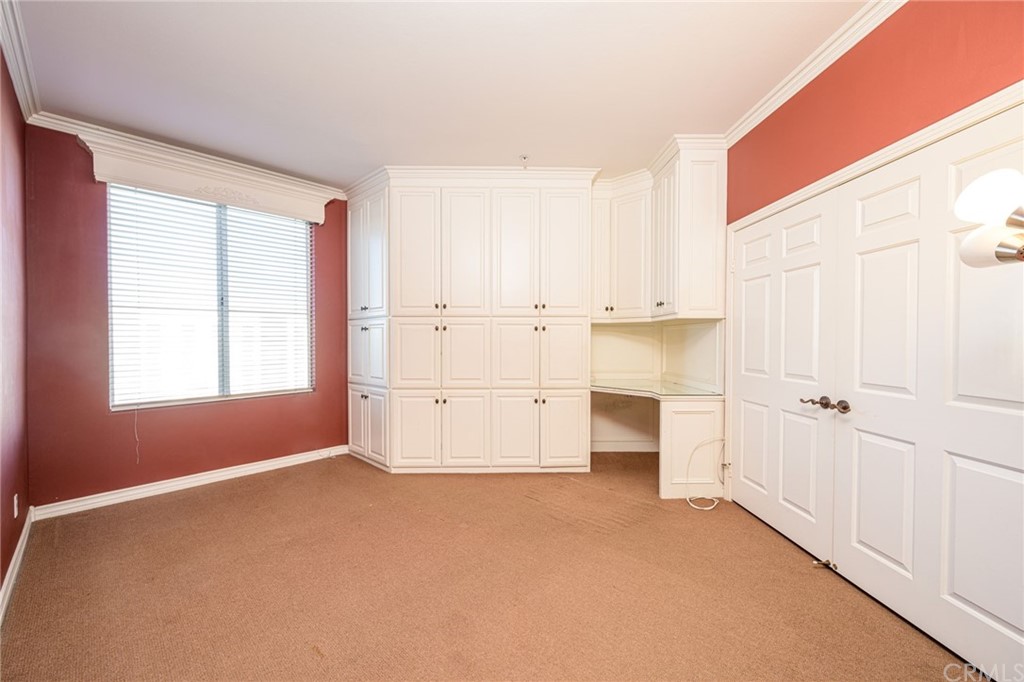 2243 Martin, Unit 409 Irvine, CA 92612 - Photo 14 of 43 a view of a livingroom with an empty space