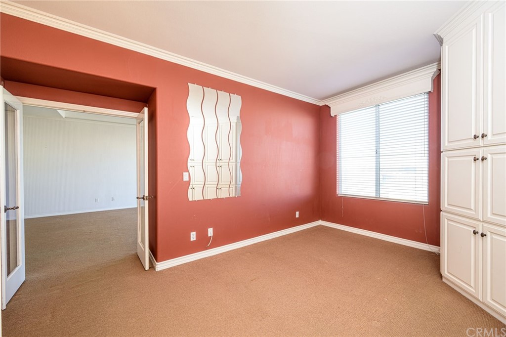 2243 Martin, Unit 409 Irvine, CA 92612 - Photo 16 of 43 an empty room with windows