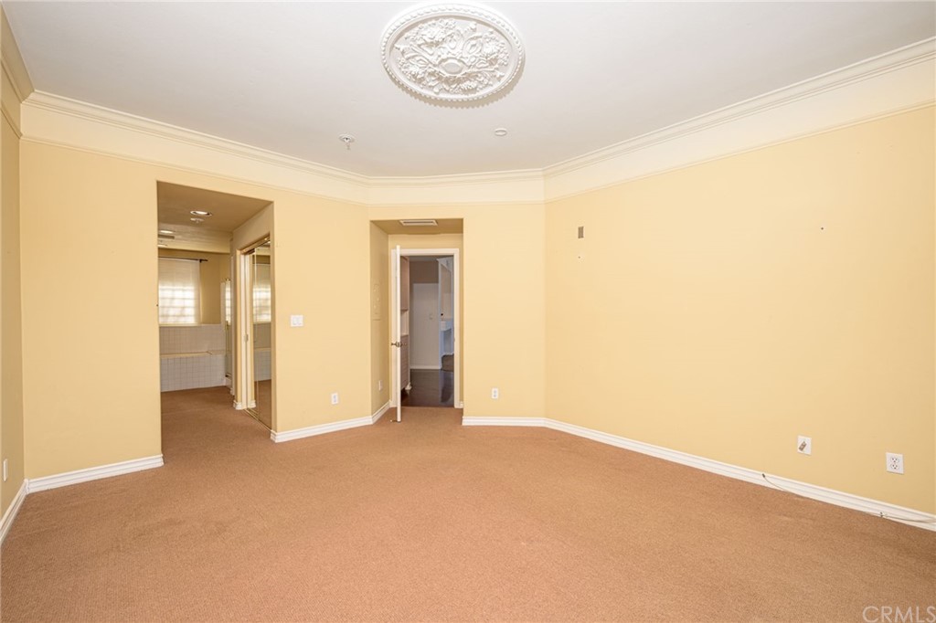 2243 Martin, Unit 409 Irvine, CA 92612 - Photo 21 of 43 a view of an empty room with a kitchen