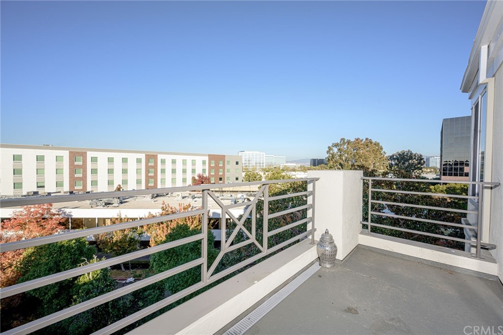 2243 Martin, Unit 409 Irvine, CA 92612 - Photo 27 of 43 a view of a room with racks on the wall