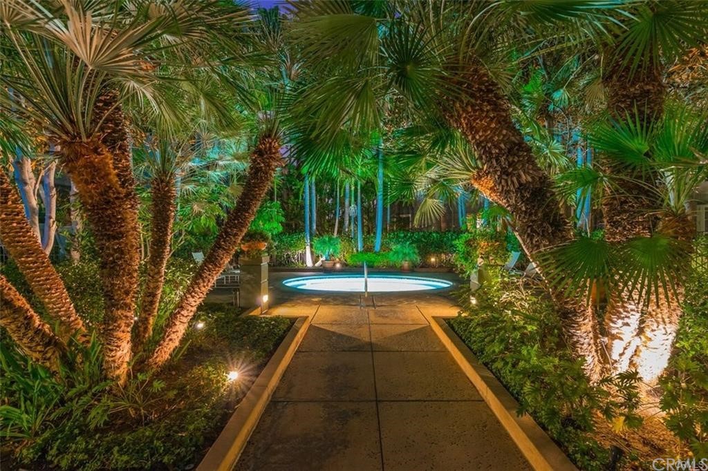 2243 Martin, Unit 409 Irvine, CA 92612 - Photo 38 of 43 a view of a yard with plants and a trees