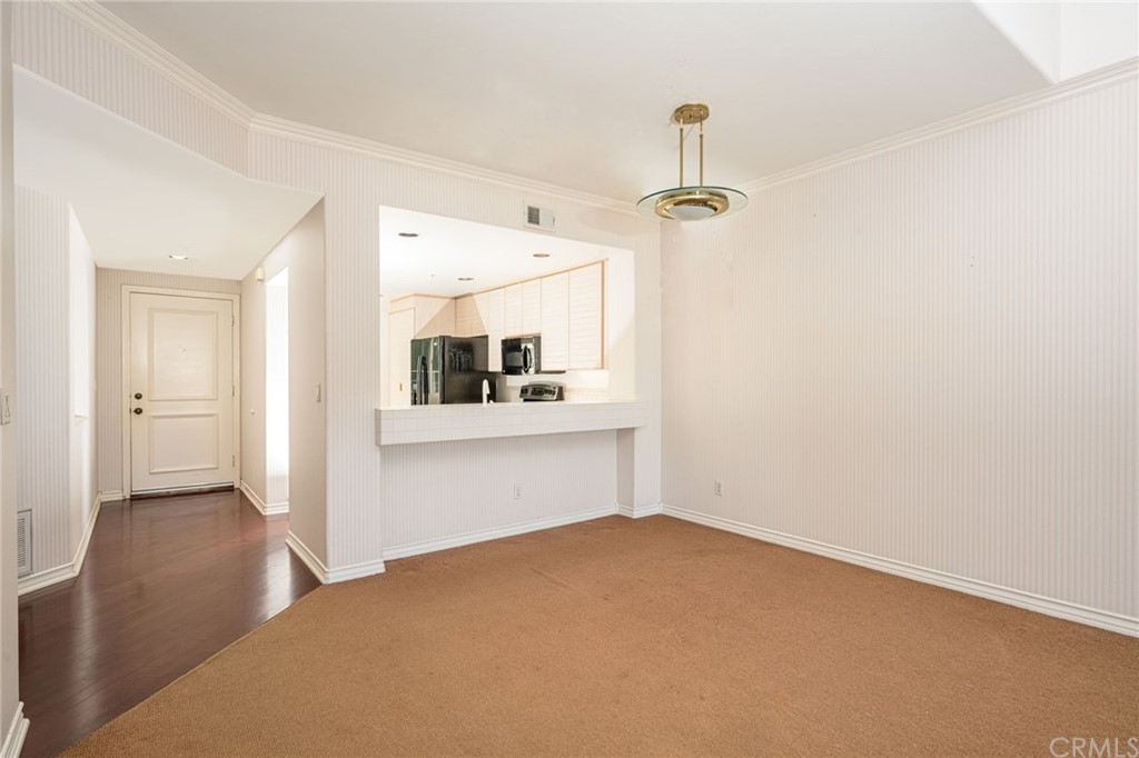 2243 Martin, Unit 409 Irvine, CA 92612 - Photo 8 of 43 a view of empty room with windows