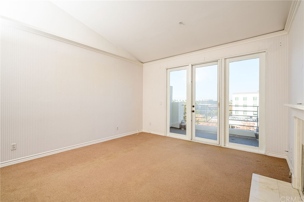 2243 Martin, Unit 409 Irvine, CA 92612 - Photo 10 of 43 an empty room with windows
