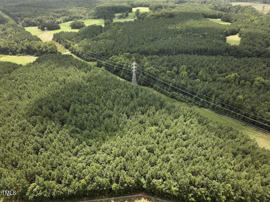 5 Todd Road Roxboro, NC 27574 - Photo 22 of 39 a view of a lake with a yard