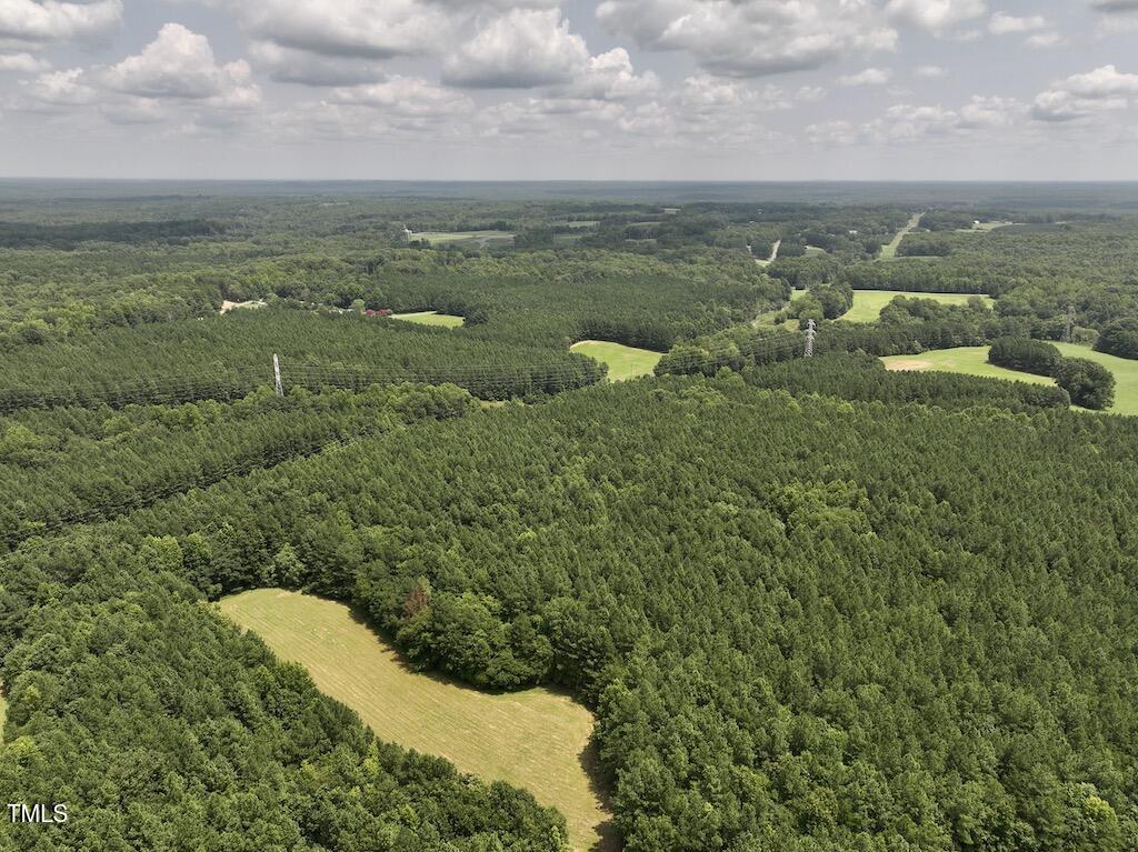 5 Todd Road Roxboro, NC 27574 - Photo 9 of 39 a view of a lake with green space