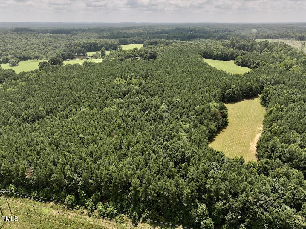 5 Todd Road Roxboro, NC 27574 - Photo 10 of 39 a view of a lake with a yard
