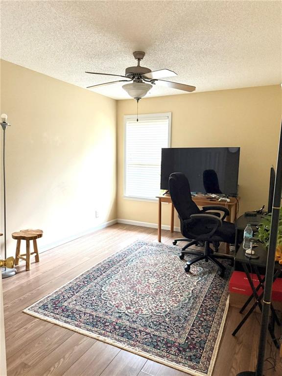 181 Masters Cove Macon, GA 31211 - Photo 7 of 16 a living room with furniture and a rug