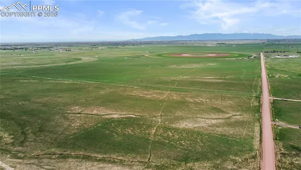 a view of a lake with a big yard