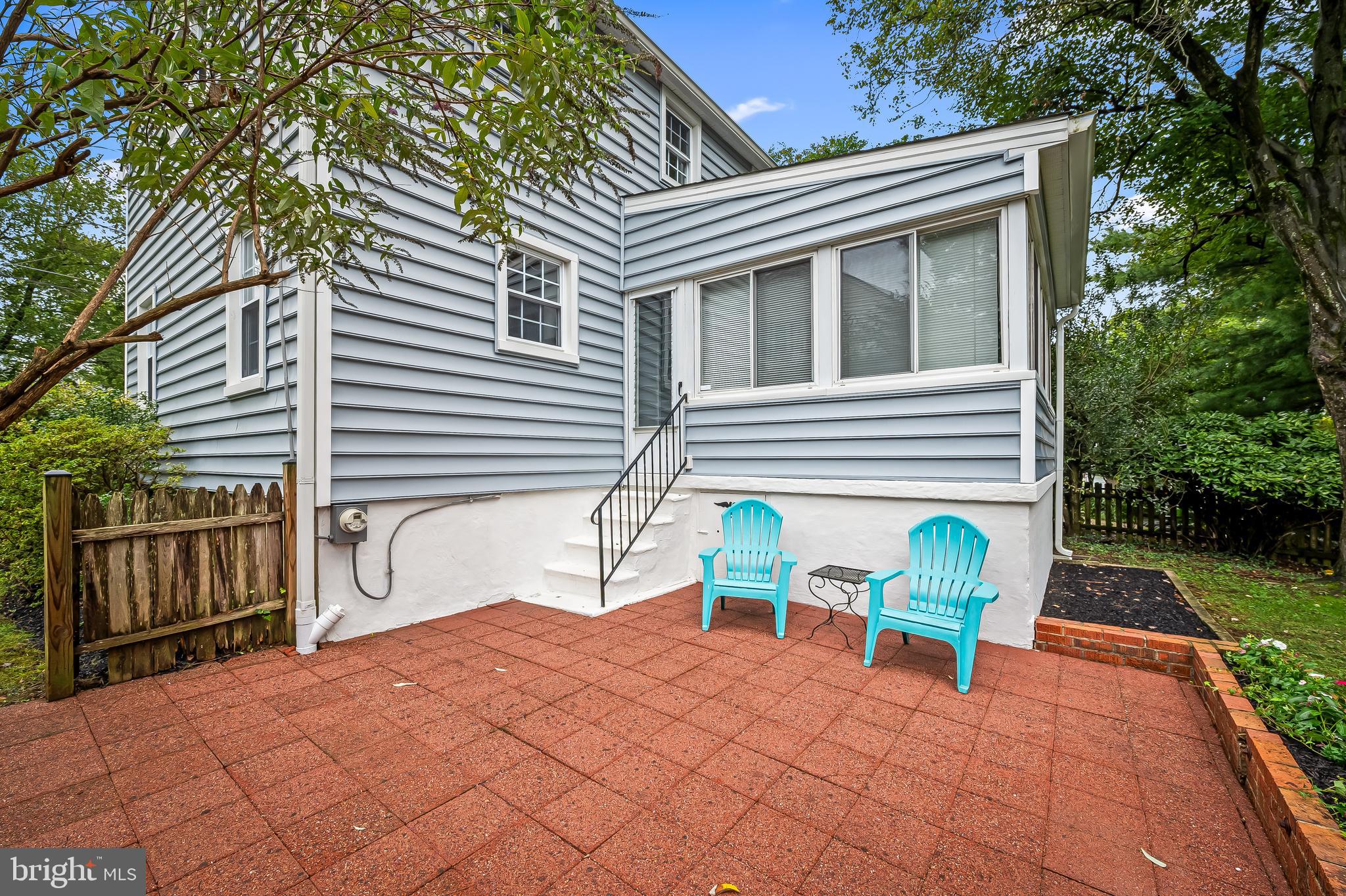 1238 Lake Falls Road Baltimore, MD 21210 - Photo 22 of 28 a backyard of a house with table and chairs