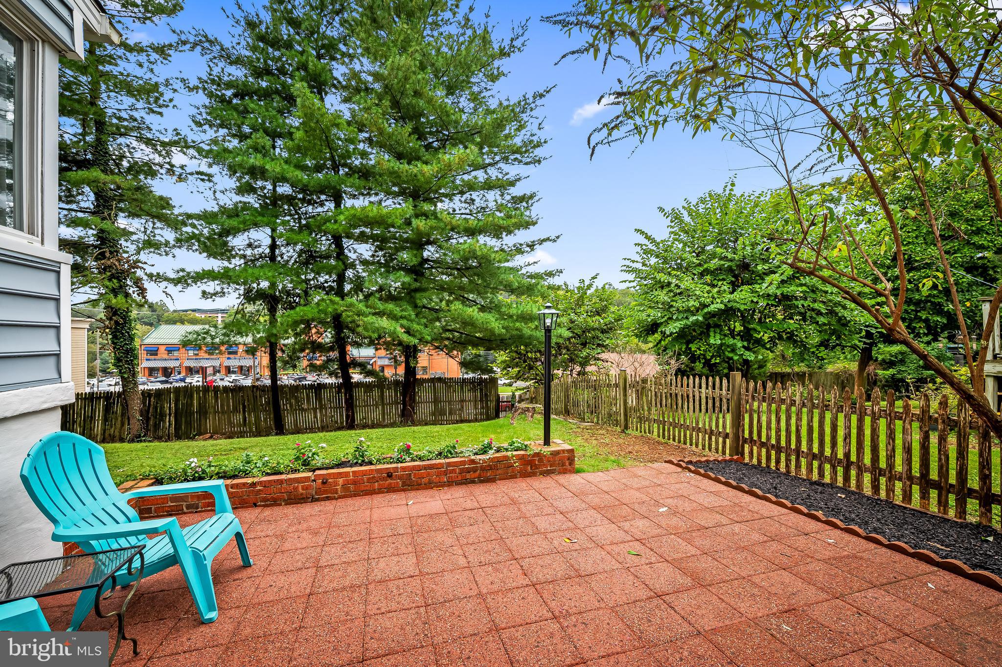 1238 Lake Falls Road Baltimore, MD 21210 - Photo 24 of 28 a view of backyard with seating and green space