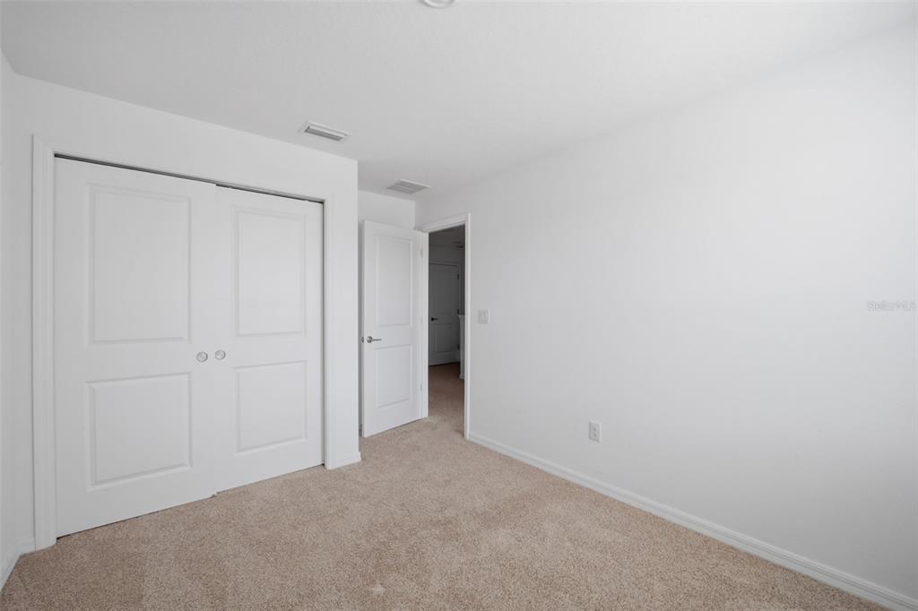 2407 Paravane Way Wesley Chapel, FL 33543 - Photo 18 of 32 a view of an empty room