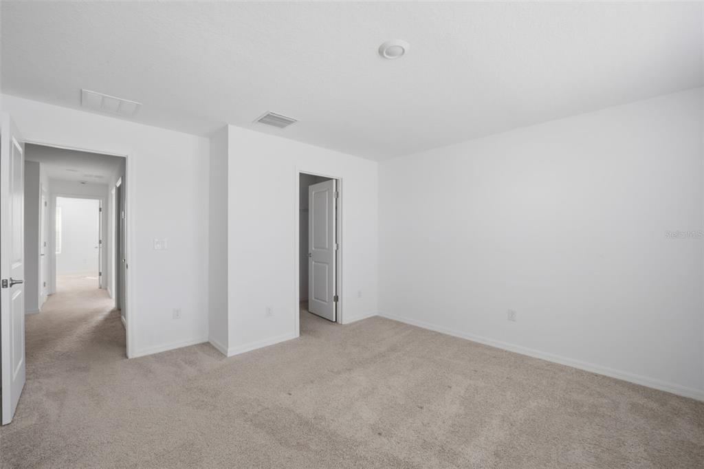 2407 Paravane Way Wesley Chapel, FL 33543 - Photo 20 of 32 a view of an empty room