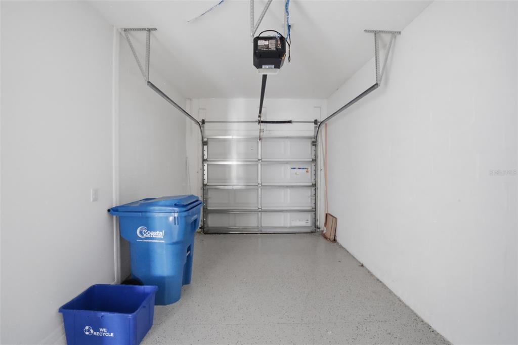 2407 Paravane Way Wesley Chapel, FL 33543 - Photo 32 of 32 a view of storage and utility room with racks on the wall