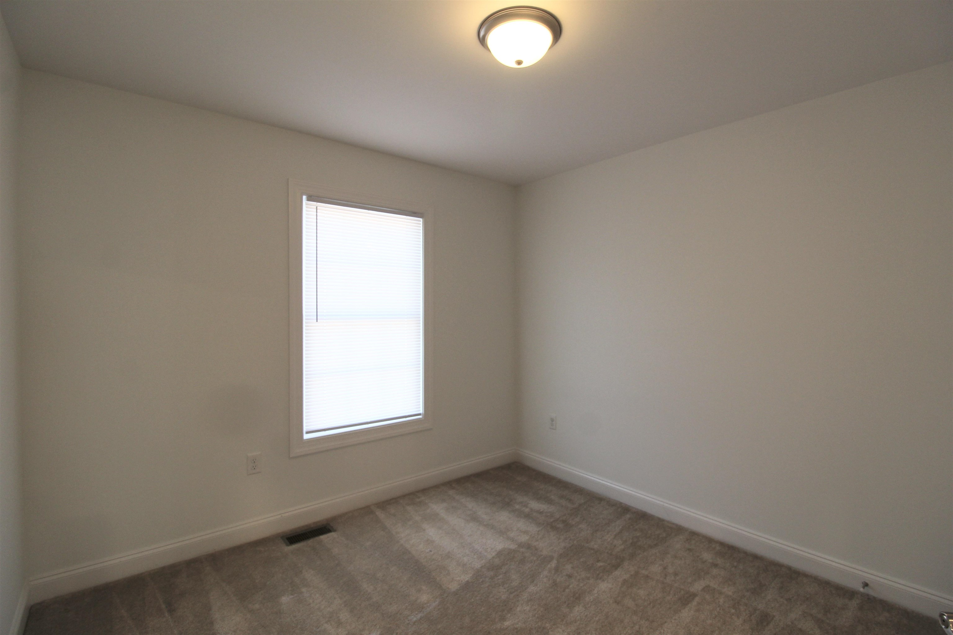 1145 Bluemoon Drive Harrisonburg, VA 22801 - Photo 12 of 18 an empty room with a window