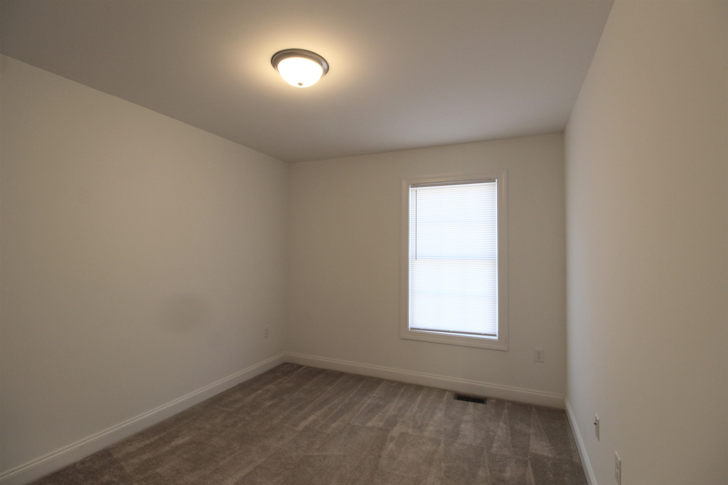 1145 Bluemoon Drive Harrisonburg, VA 22801 - Photo 6 of 18 an empty room with a window