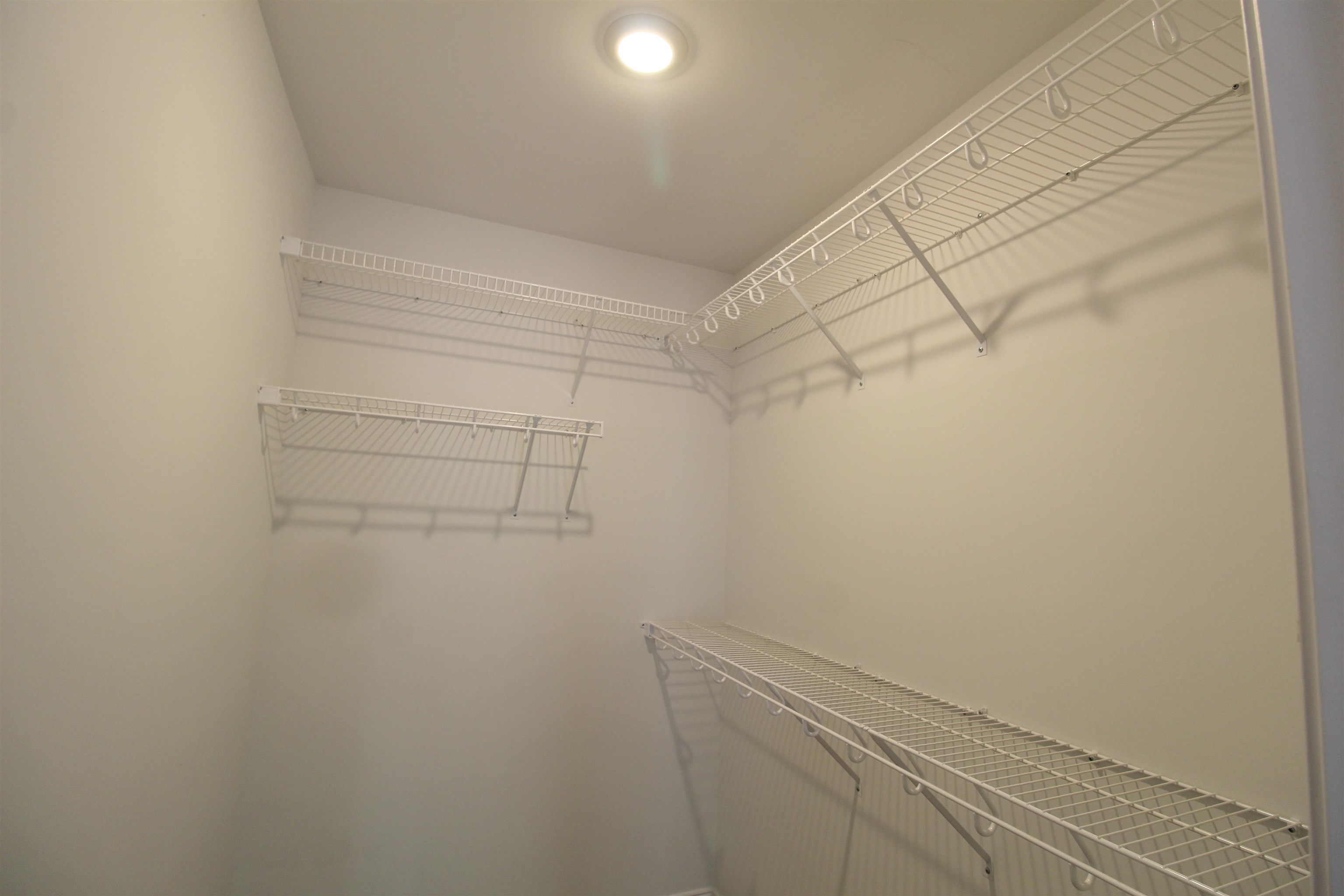 1145 Bluemoon Drive Harrisonburg, VA 22801 - Photo 8 of 18 a view of a room with racks on the wall
