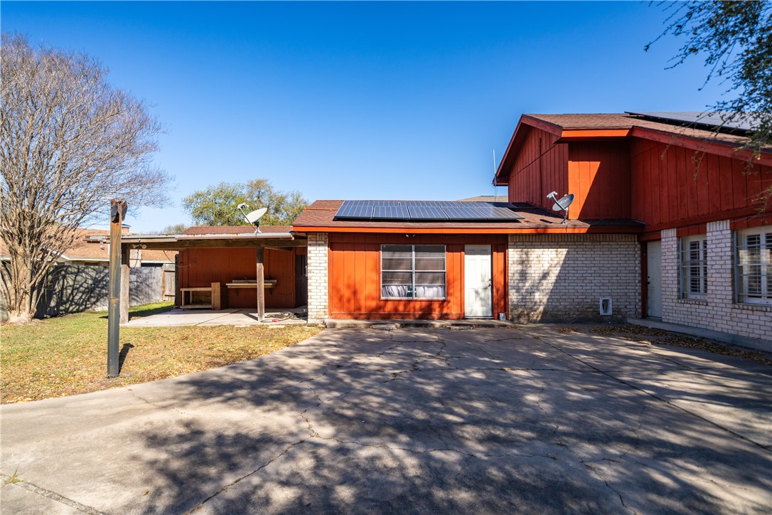 2217 Post Oak Drive Portland, TX 78374 - Photo 35 of 39 a view of a house with a yard and garage