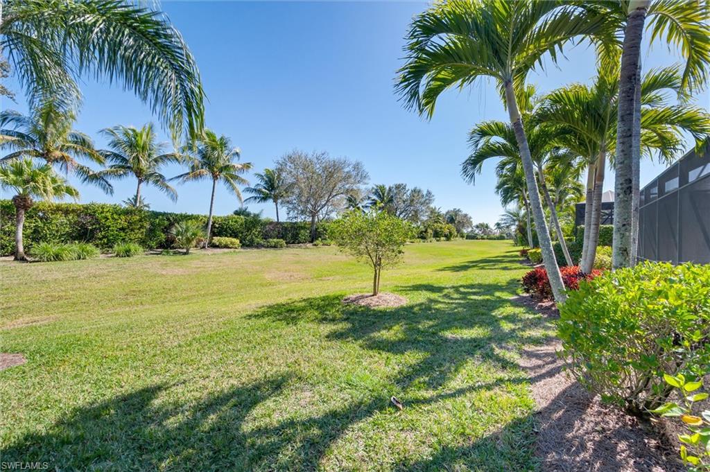 7660 Cottesmore Drive Naples, FL 34113 - Photo 27 of 50 a view of a park with palm trees