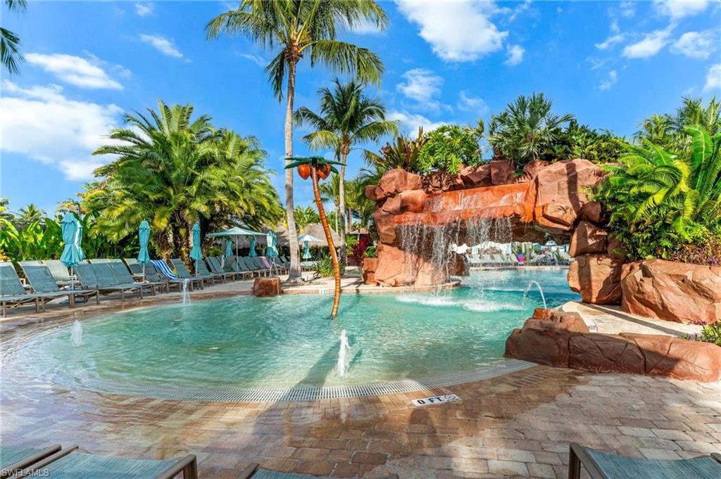 7660 Cottesmore Drive Naples, FL 34113 - Photo 48 of 50 a view of a park with palm trees