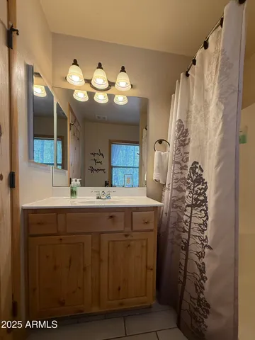 a room with a bed and a window