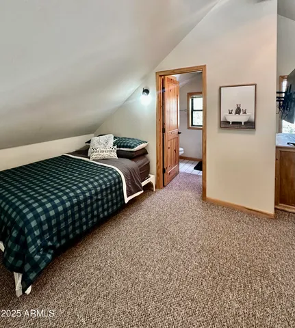 a bedroom with a bed